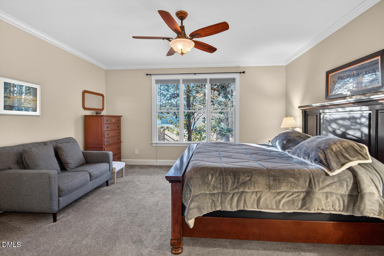 10775 Buffalo Creek Road Rougemont, NC 27572 - Photo 31 of 65 a bedroom with a bed couches and window