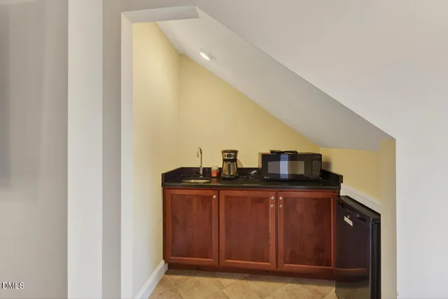 a view of street with houses on both side