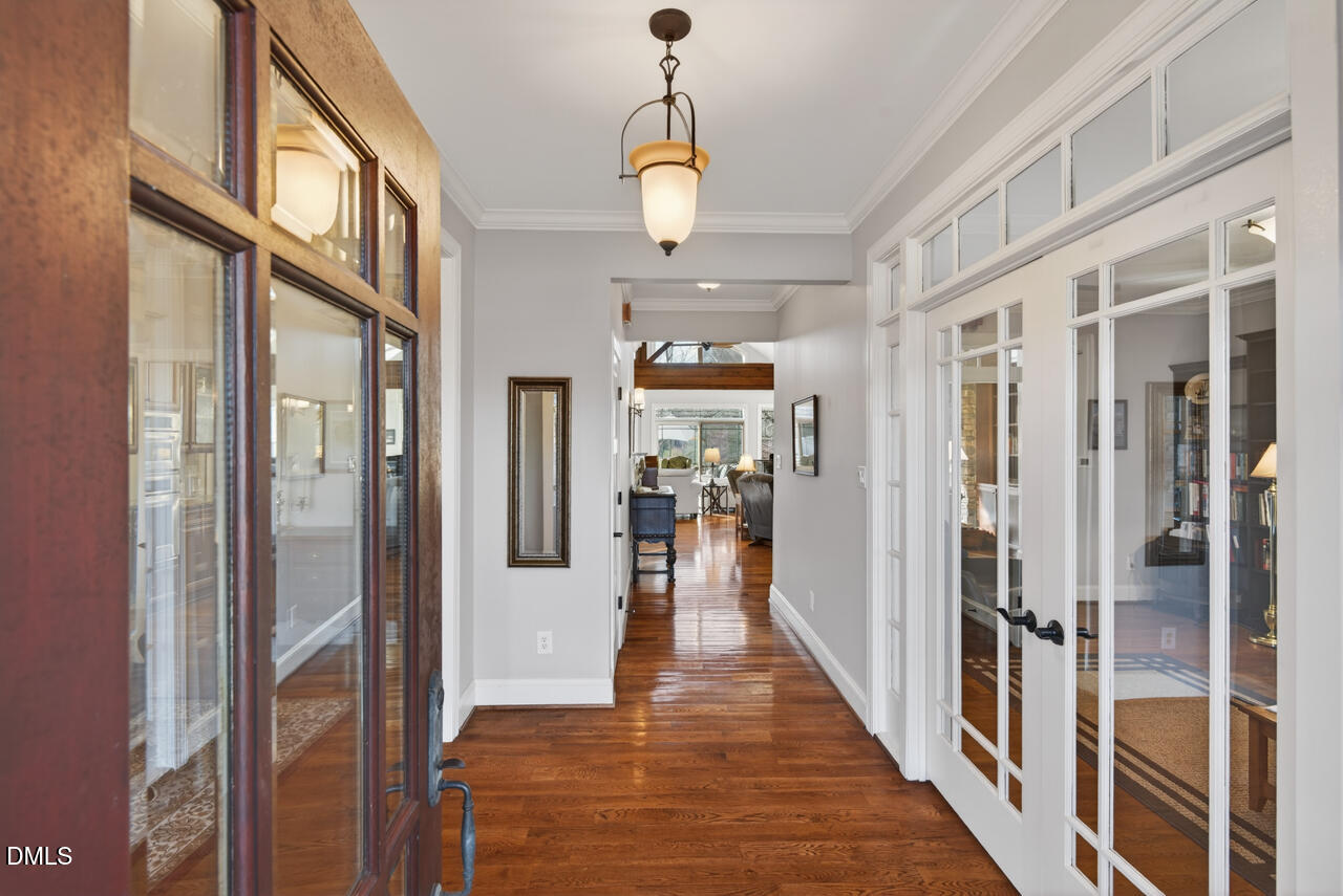 10775 Buffalo Creek Road Rougemont, NC 27572 - Photo 8 of 65 a view of a hallway view with wooden floor and staircase