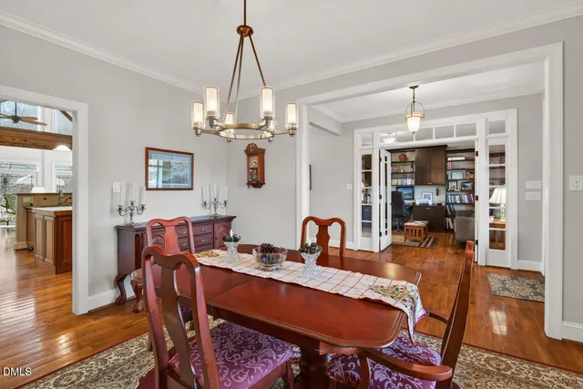 a view of a dining room with furniture and window