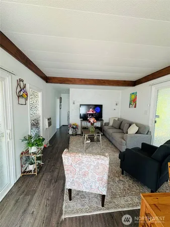 a living room with furniture and a couch