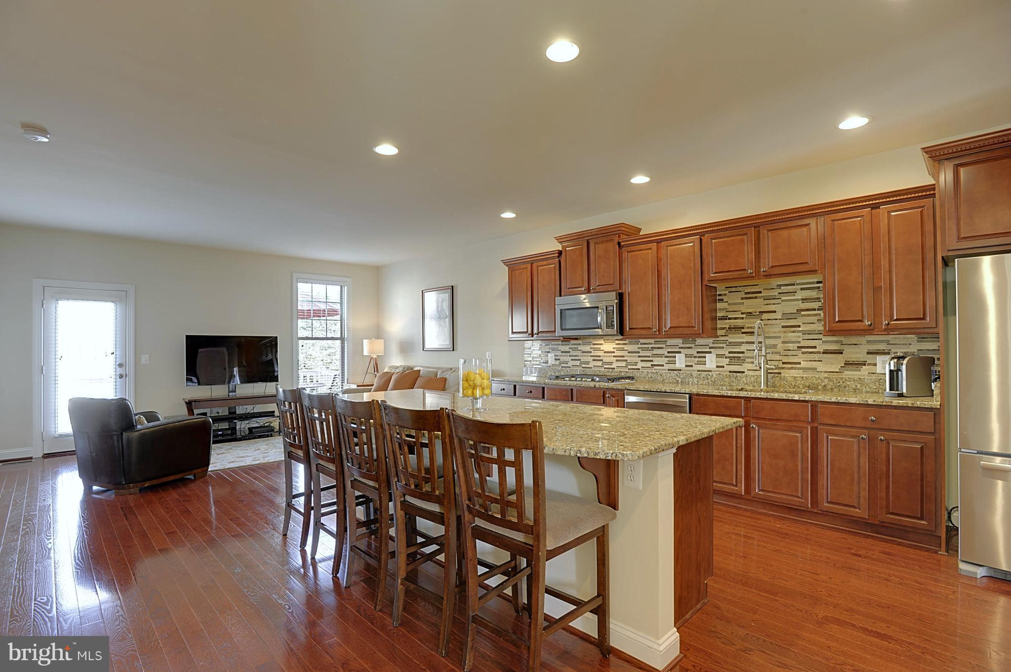 43346 Old Ryan Road Ashburn, VA 20148 - Photo 2 of 25 Kitchen w/tile backsplash and granite counters