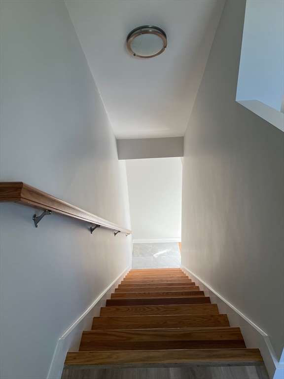 151 Shepard Street, Unit 14 Lynn, MA 01902 - Photo 19 of 22 a bedroom with a bed and a window