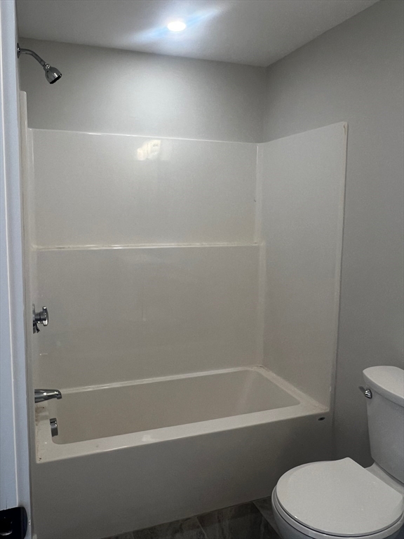 151 Shepard Street, Unit 14 Lynn, MA 01902 - Photo 20 of 22 a toilet sitting next to a bath tub
