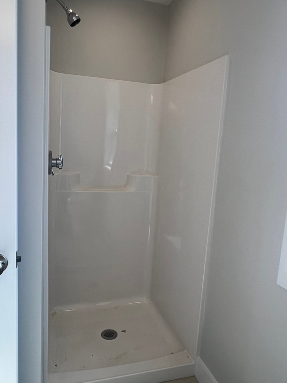 151 Shepard Street, Unit 14 Lynn, MA 01902 - Photo 10 of 22 a bathroom with a shower