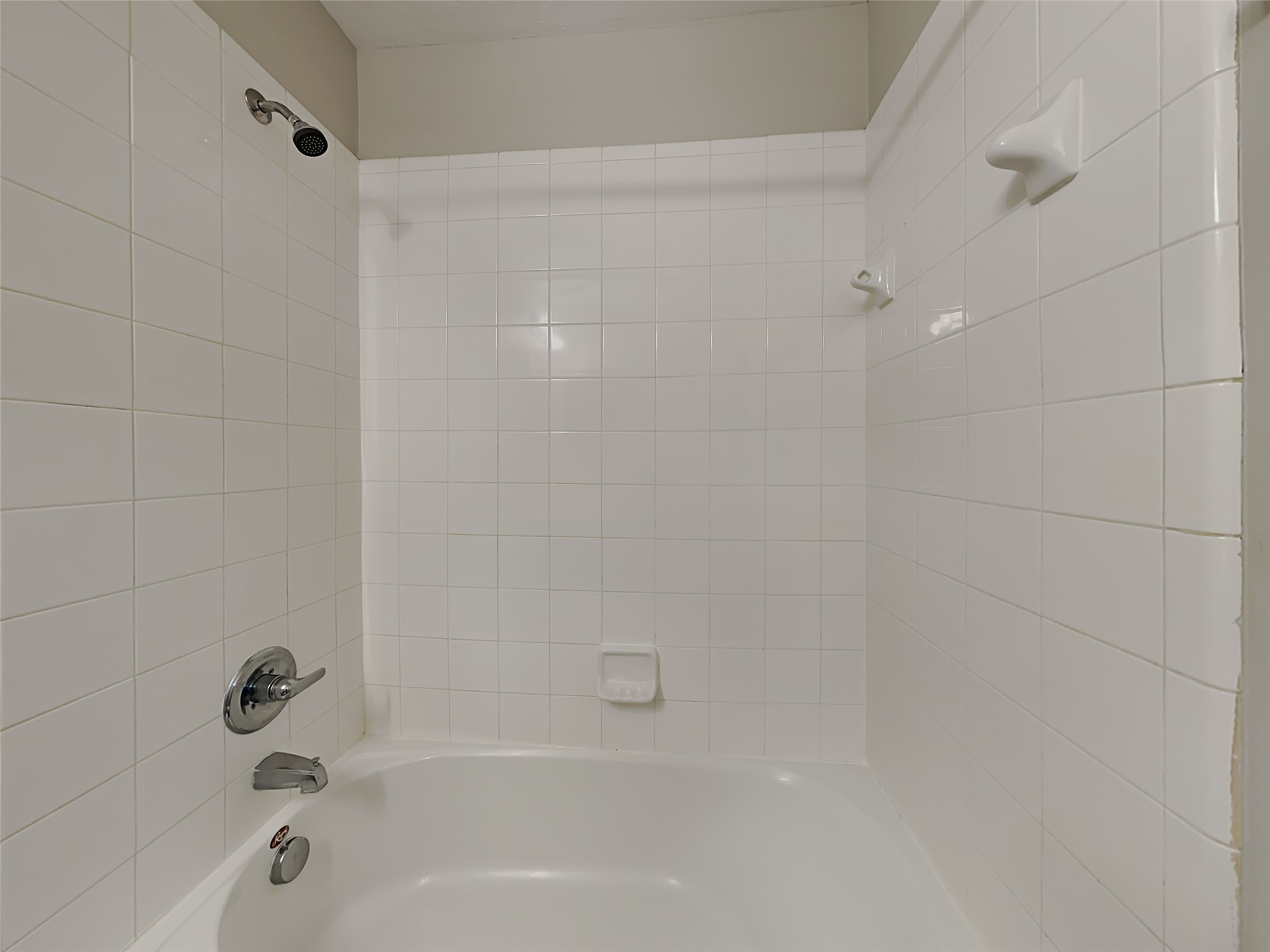 8119 Katie Mill Trail Spring, TX 77379 - Photo 7 of 18 a bathroom with a bathtub