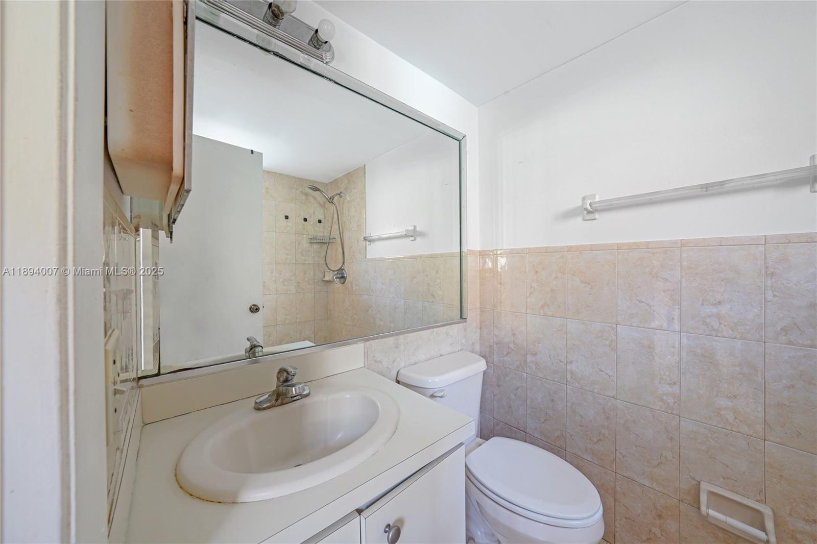 5490 West 21st Court, Unit 112 Hialeah, FL 33016 - Photo 8 of 43 a bathroom with a sink toilet and shower