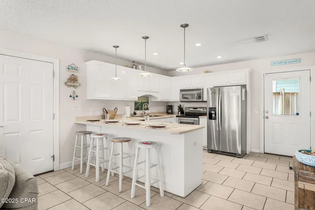 $449,900 | 303 La Paloma Place, Panama City Beach, FL 32413