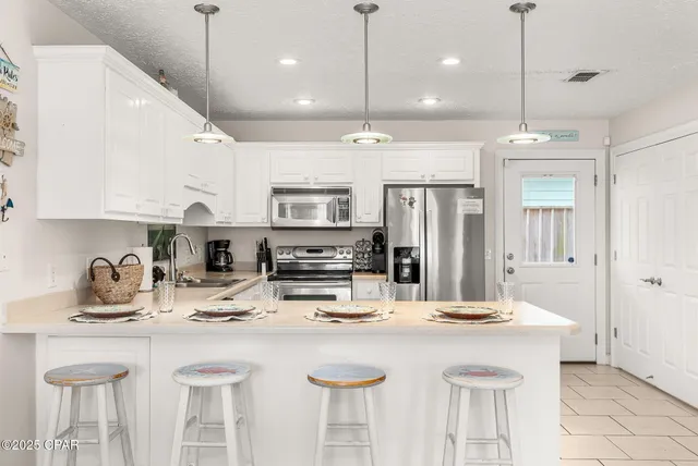 $449,900 | 303 La Paloma Place, Panama City Beach, FL 32413