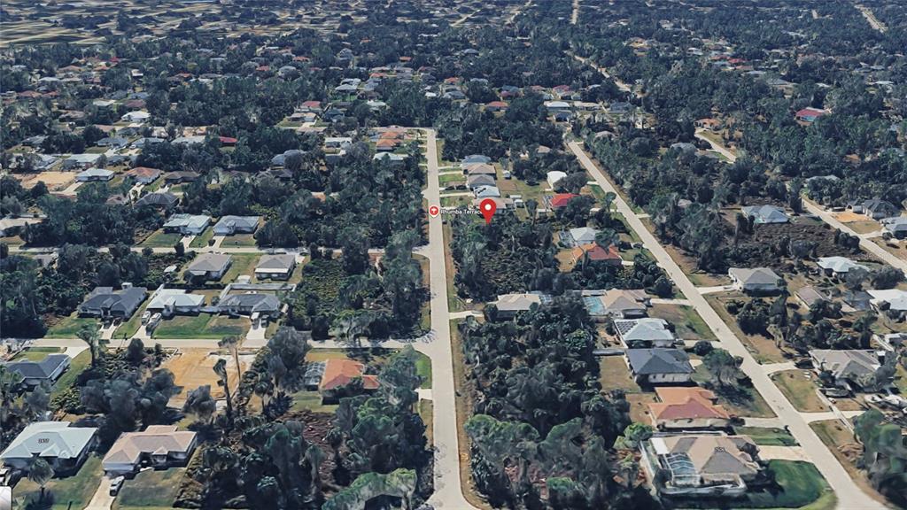 Rhumba Ter Port North Port, FL 34286 - Photo 11 of 13 an aerial view of residential houses with outdoor space