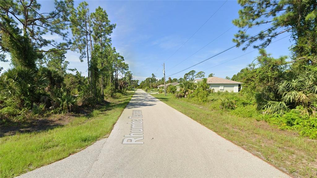Rhumba Ter Port North Port, FL 34286 - Photo 7 of 13 a view of street view with a yard