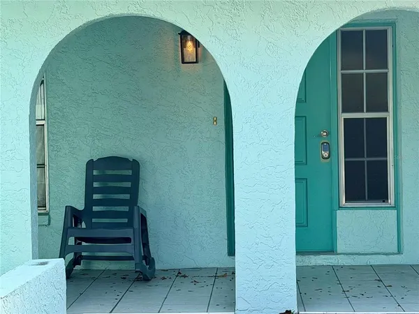 a view of entryway with a front door