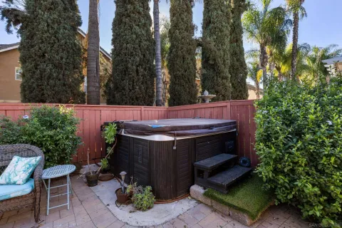 a view of table and chairs in patio