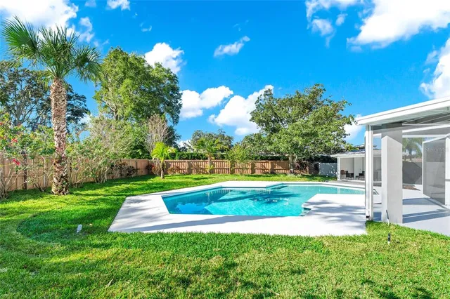 a outdoor living space with furniture and garden view