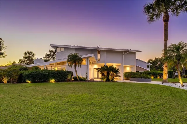 a view of a yard in front of house with a yard