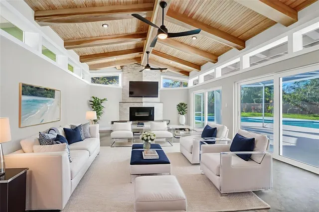 a view of a livingroom with wooden floor and cabinet