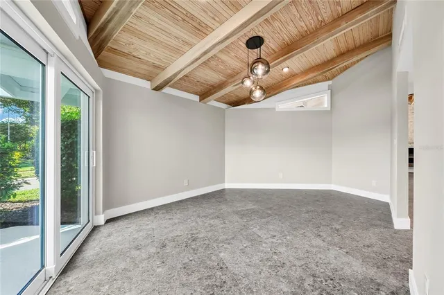 a view of a swimming pool with an outdoor space and seating area