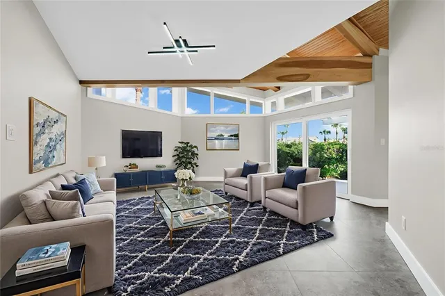 a view of a house with a swimming pool and a yard