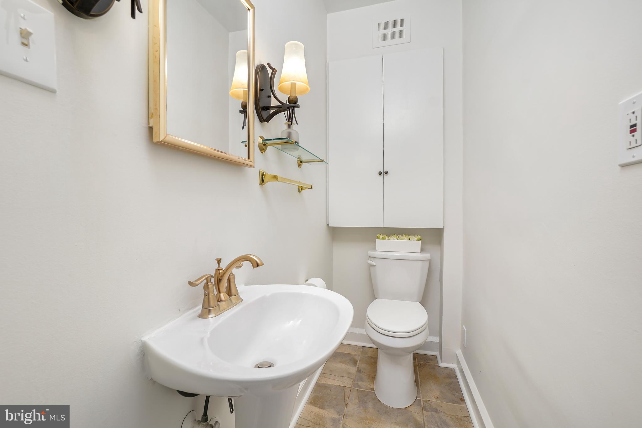 3520 S Street Northwest Washington, DC 20007 - Photo 13 of 44 a bathroom with a toilet and a sink