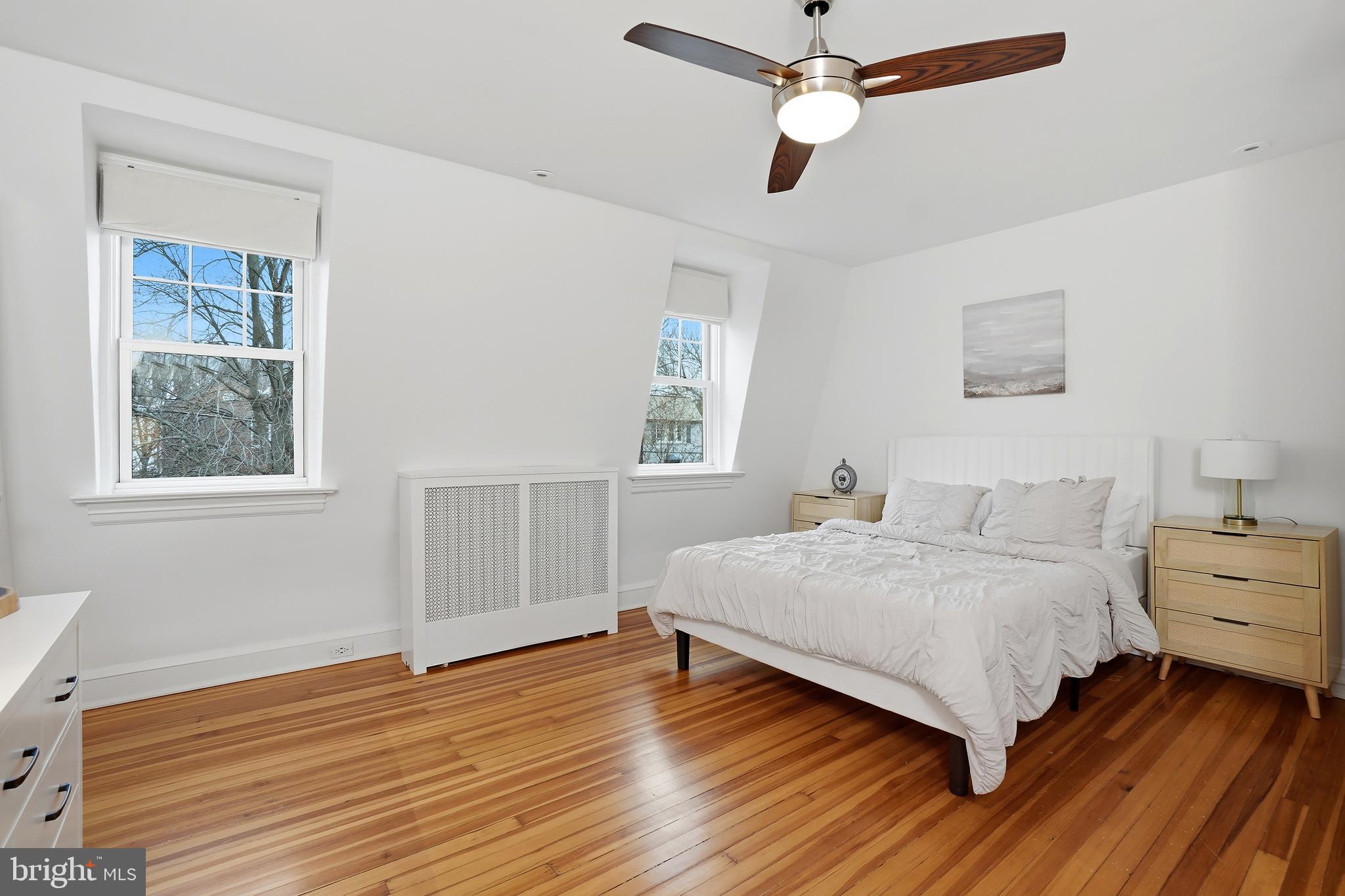 3520 S Street Northwest Washington, DC 20007 - Photo 14 of 44 a bedroom with a bed and a window