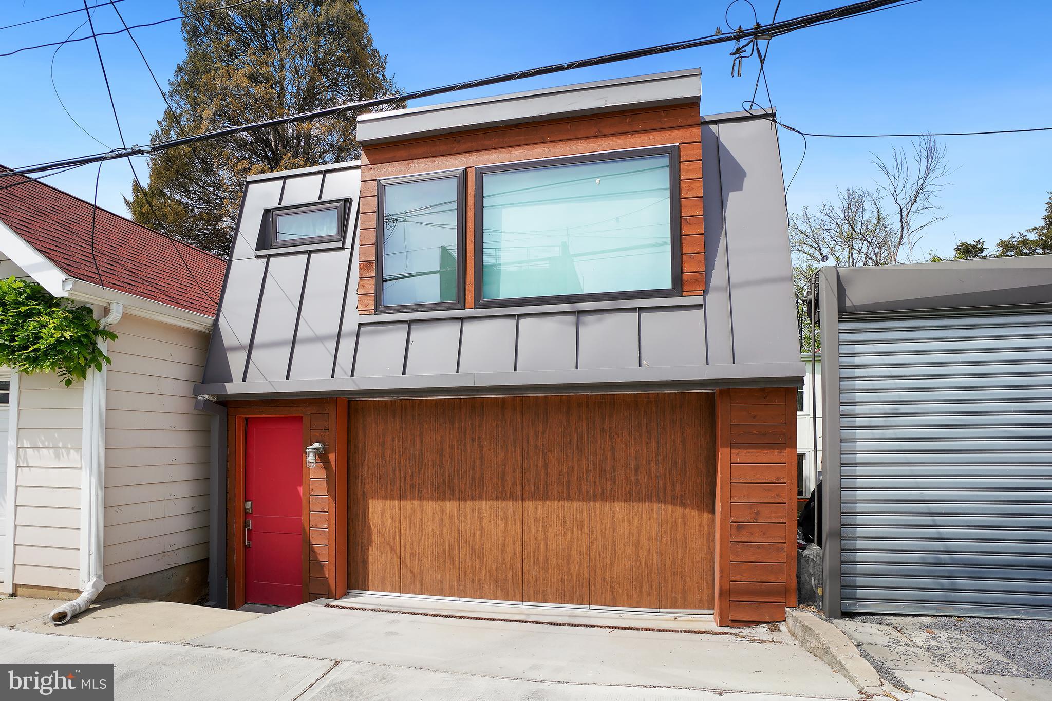 3520 S Street Northwest Washington, DC 20007 - Photo 2 of 11 a view of a house with a door and wooden wall