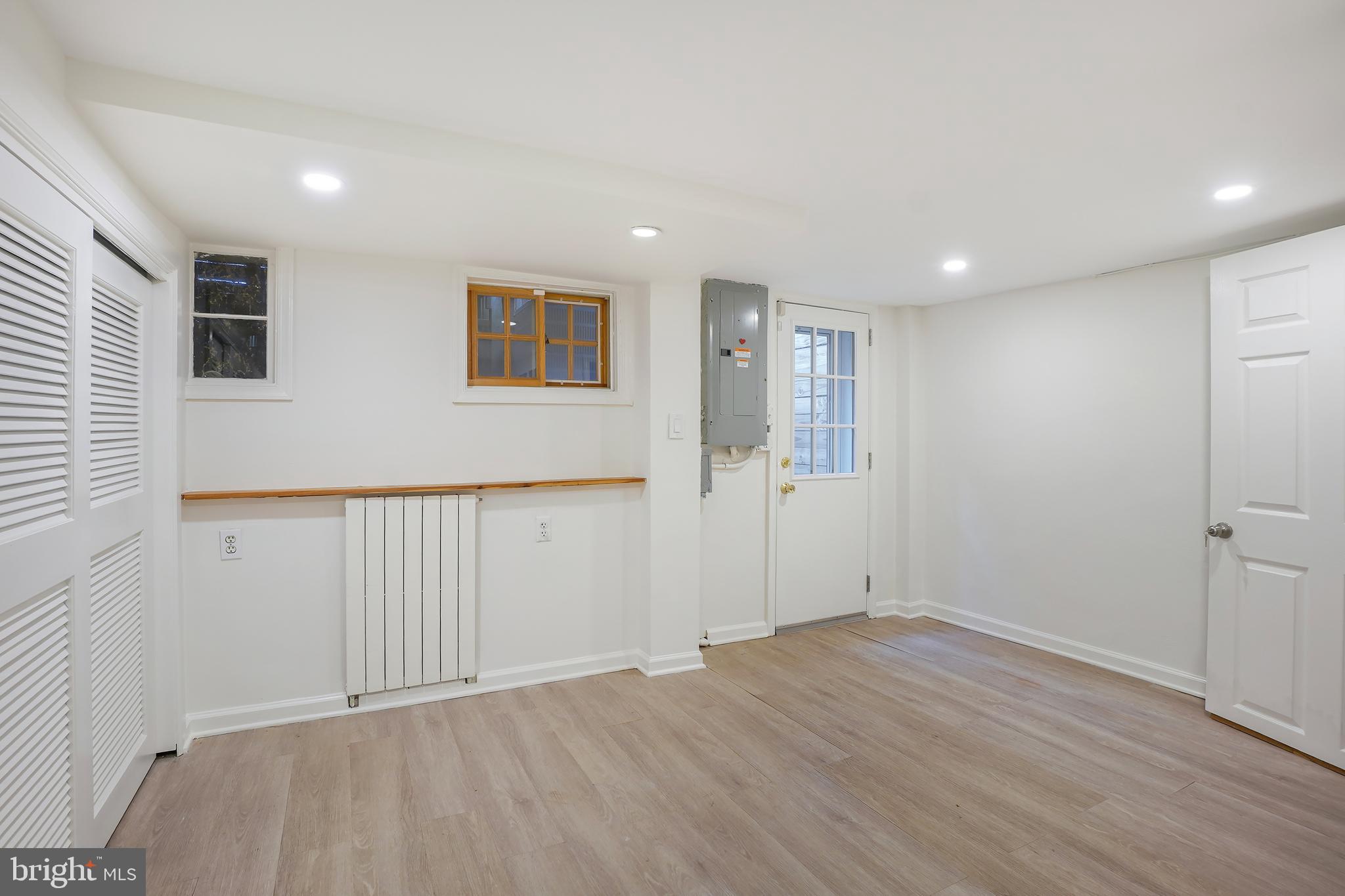 3520 S Street Northwest Washington, DC 20007 - Photo 24 of 44 a view of an empty room with wooden floor
