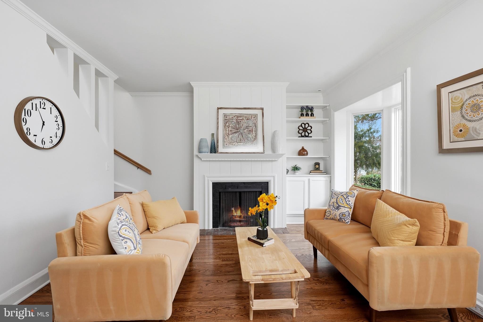 3520 S Street Northwest Washington, DC 20007 - Photo 3 of 44 a living room with furniture and a fireplace