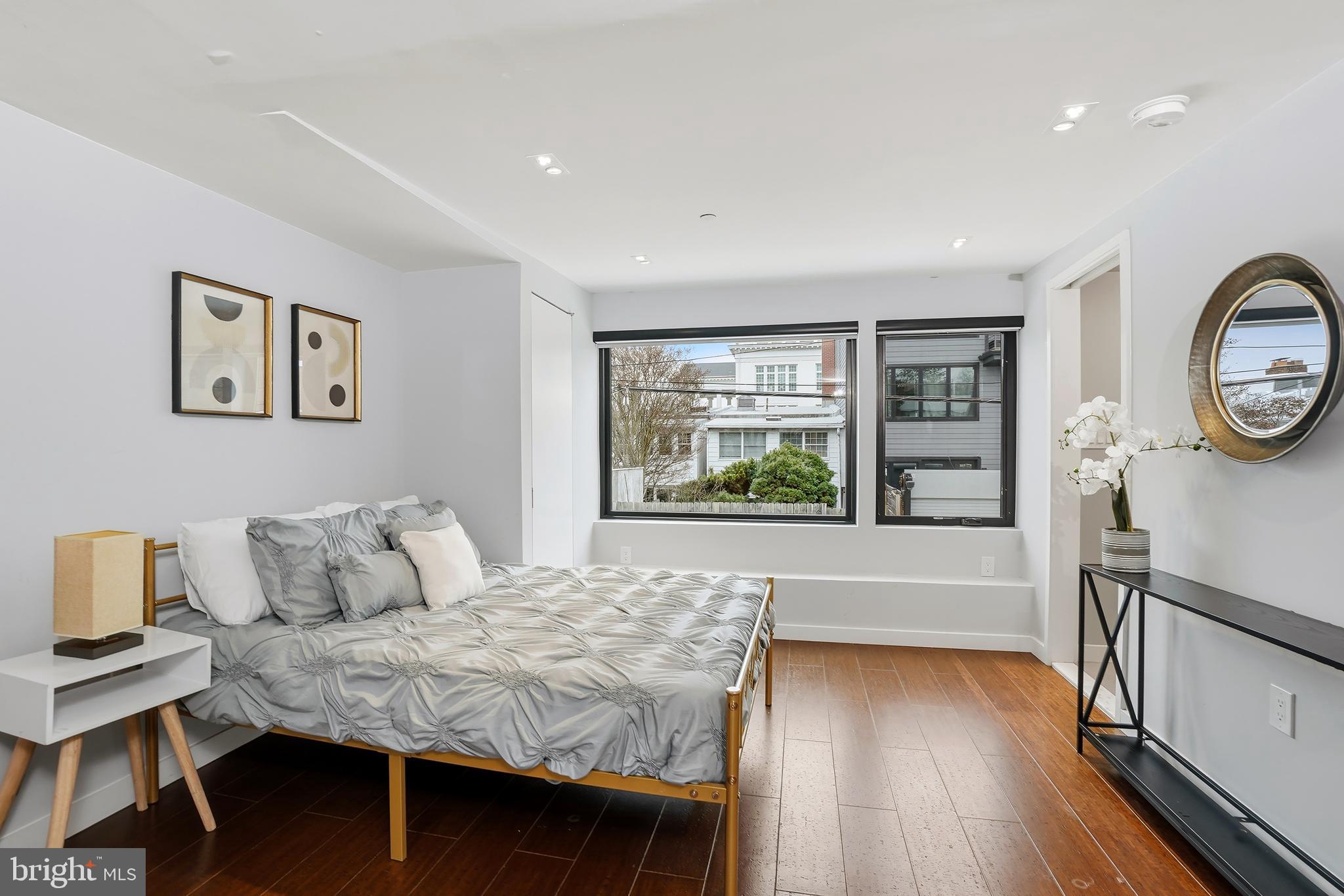 3520 S Street Northwest Washington, DC 20007 - Photo 32 of 44 a bedroom with a bed and a window