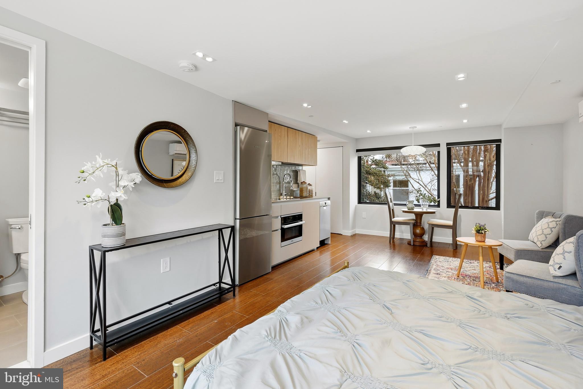 3520 S Street Northwest Washington, DC 20007 - Photo 33 of 44 a bedroom with furniture and a window