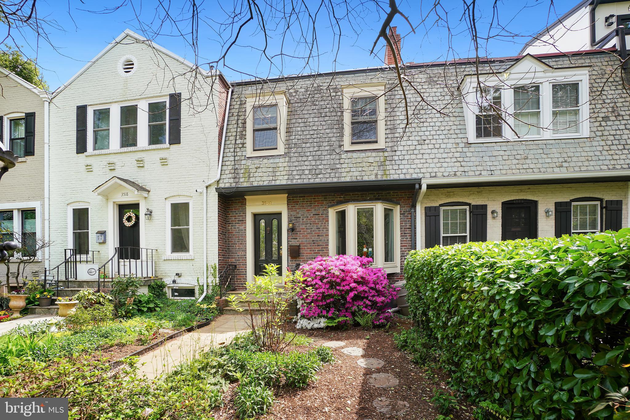 3520 S Street Northwest Washington, DC 20007 - Photo 4 of 11 a front view of a house with a yard