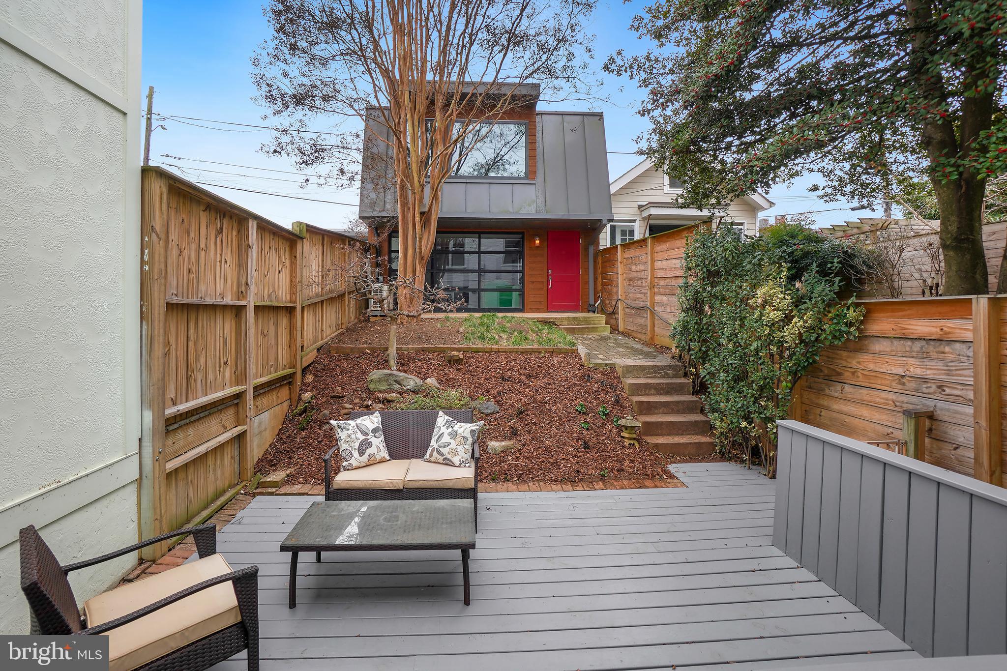 3520 S Street Northwest Washington, DC 20007 - Photo 8 of 44 a view of a chairs and tables on the deck