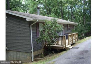 251 Delicious Road Linden, VA 22642 - Photo 2 of 27 a view of a house with a yard