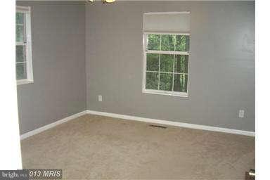 251 Delicious Road Linden, VA 22642 - Photo 14 of 27 an empty room with a window