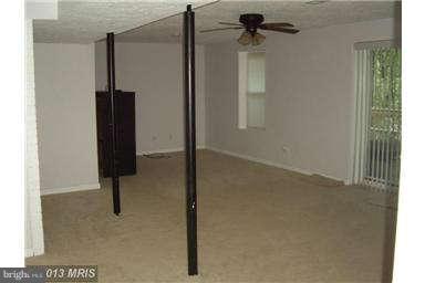 251 Delicious Road Linden, VA 22642 - Photo 17 of 27 a view of closet with wooden floor