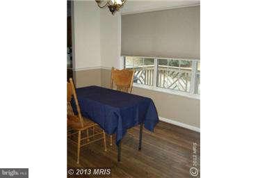 251 Delicious Road Linden, VA 22642 - Photo 7 of 27 a view of a room with furniture and wooden floor