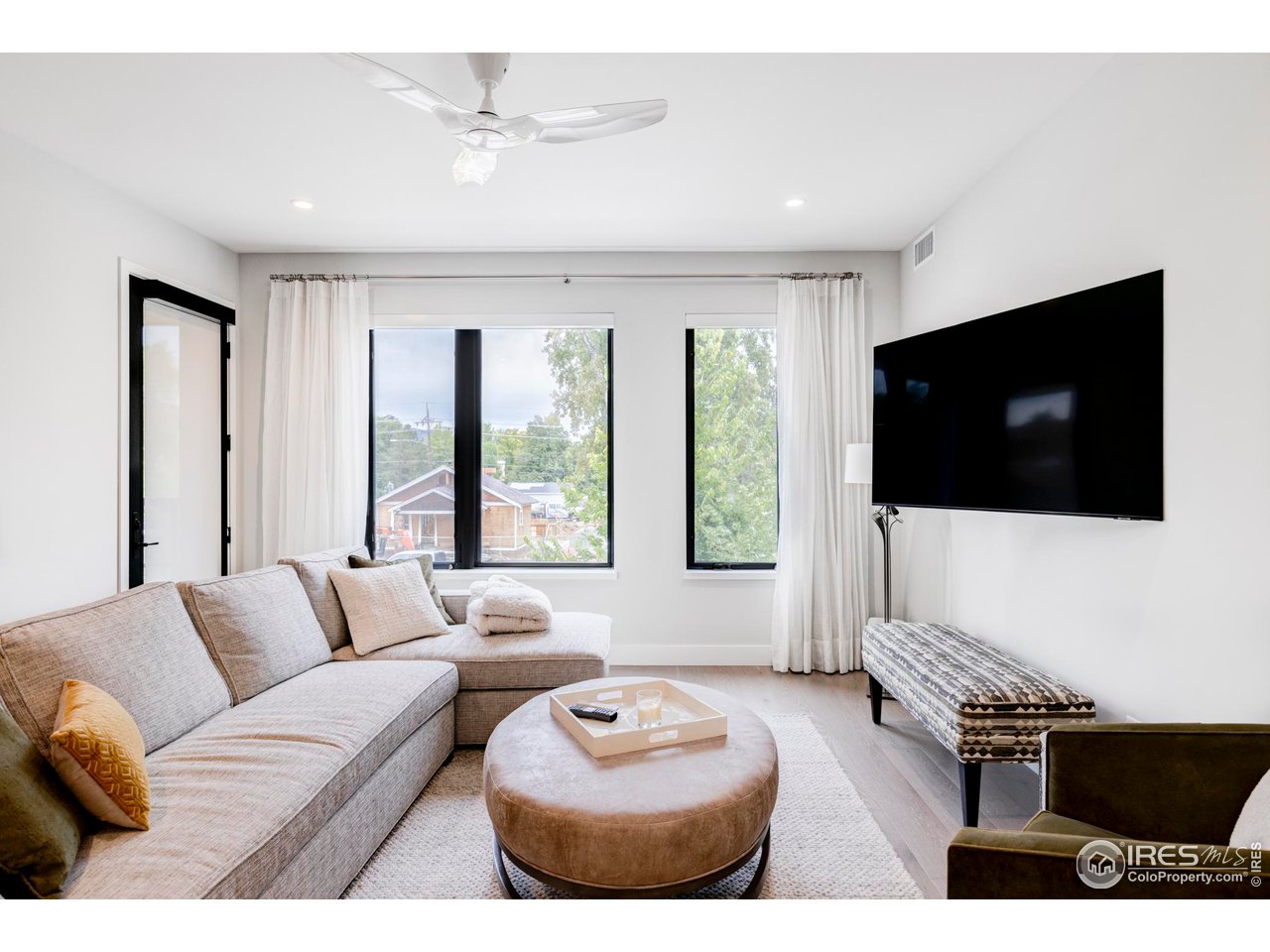 2718 Pine Street, Unit 202 Boulder, CO 80302 - Photo 11 of 33 Living room - remote controlled window blinds throughout unit