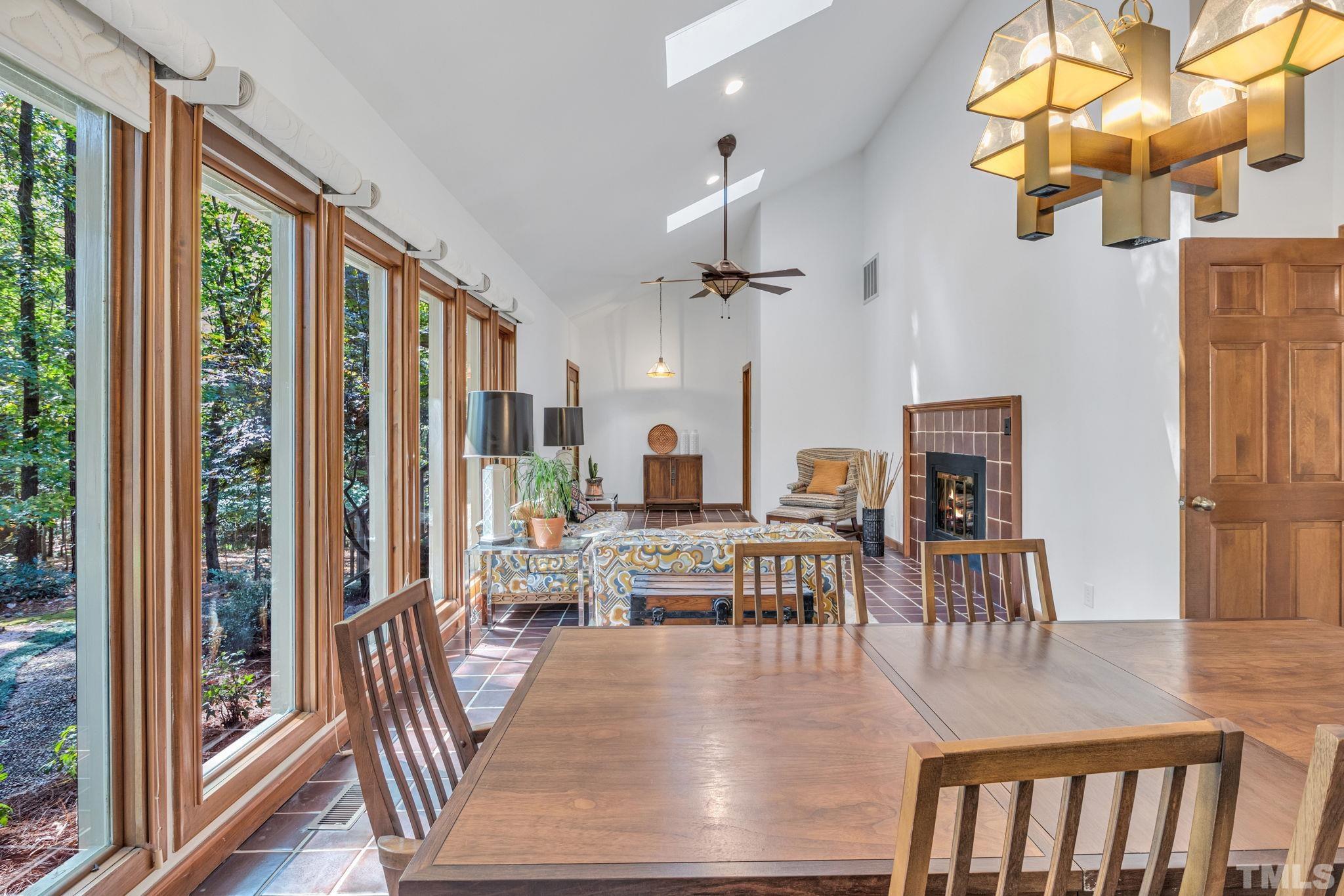 10229 Boxelder Drive Raleigh, NC 27613 - Photo 9 of 52 a view of a dining room with furniture window and outside view