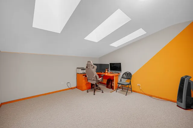 a view of a room with work space