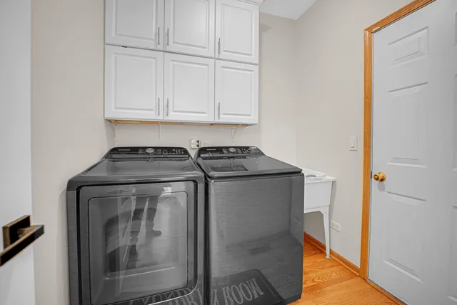 a utility room with washer and dryer