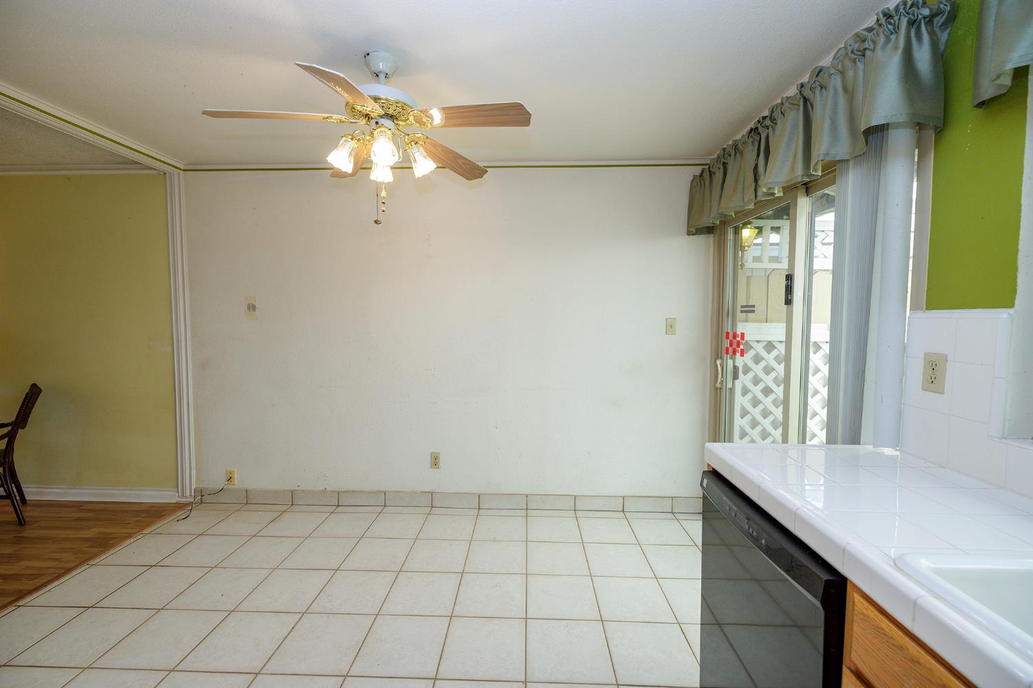 617 West Granger Avenue, Unit 48 Modesto, CA 95350 - Photo 13 of 27 a view of an empty room and window