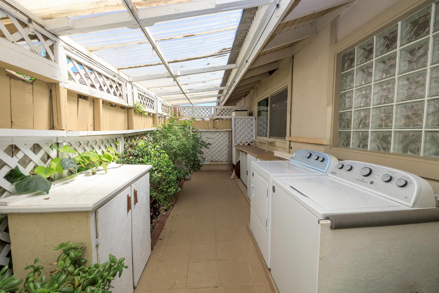 617 West Granger Avenue, Unit 48 Modesto, CA 95350 - Photo 21 of 27 a utility room with dryer and washer