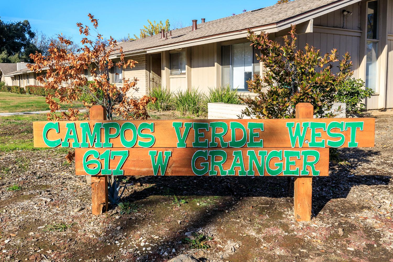 617 West Granger Avenue, Unit 48 Modesto, CA 95350 - Photo 26 of 27 a street sign that is on a brick wall