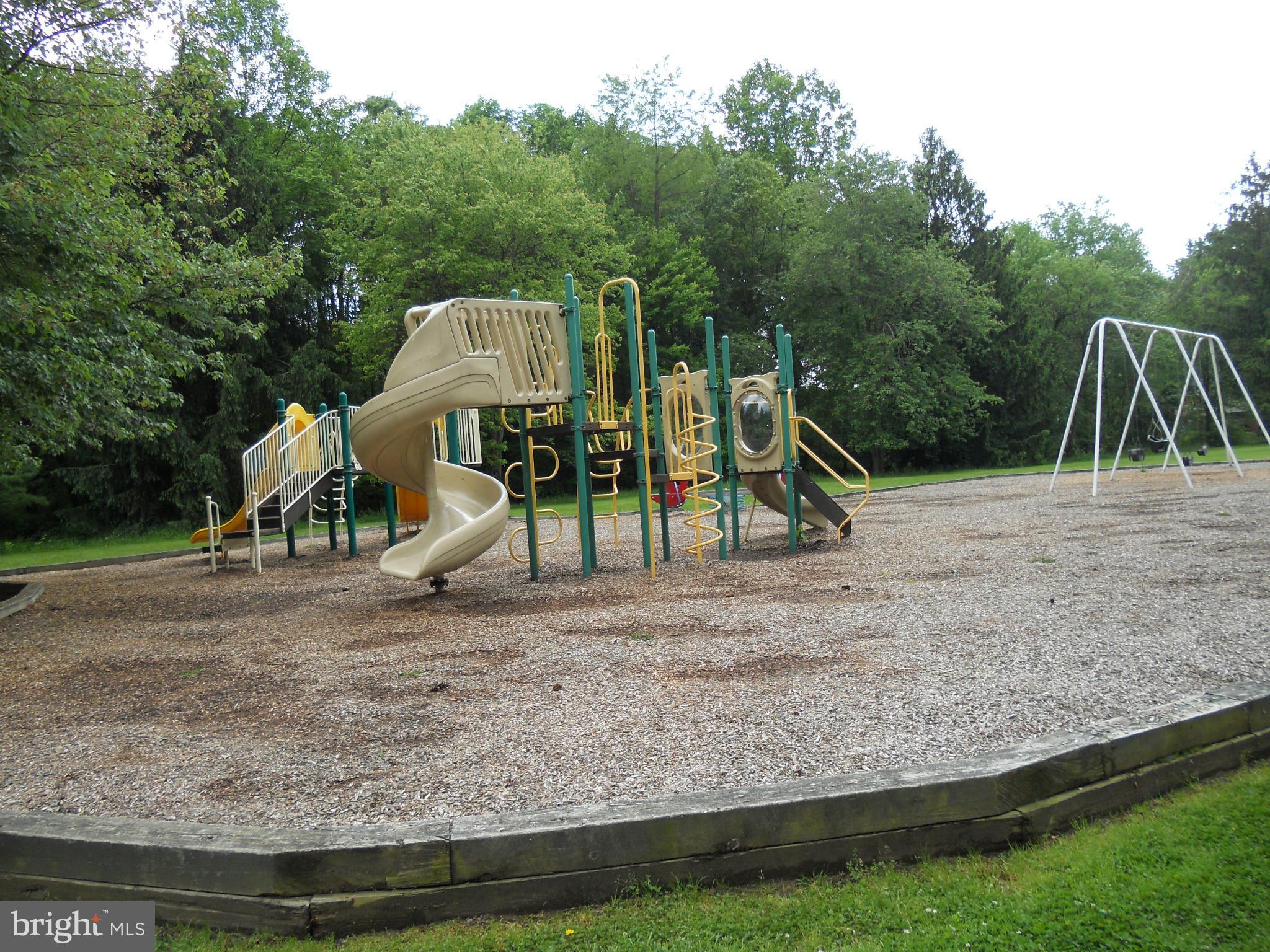 19129 Willow Grove Road Olney, MD 20832 - Photo 18 of 18 a view of outdoor space with playground and green space