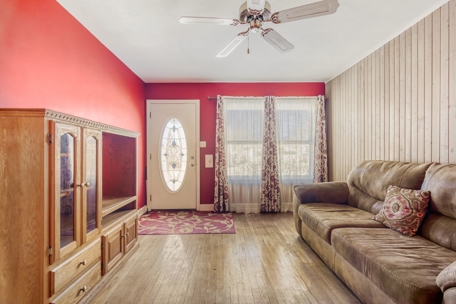 3659 Madison Street Lansing, IL 60438 - Photo 6 of 28 a living room with furniture and a large window