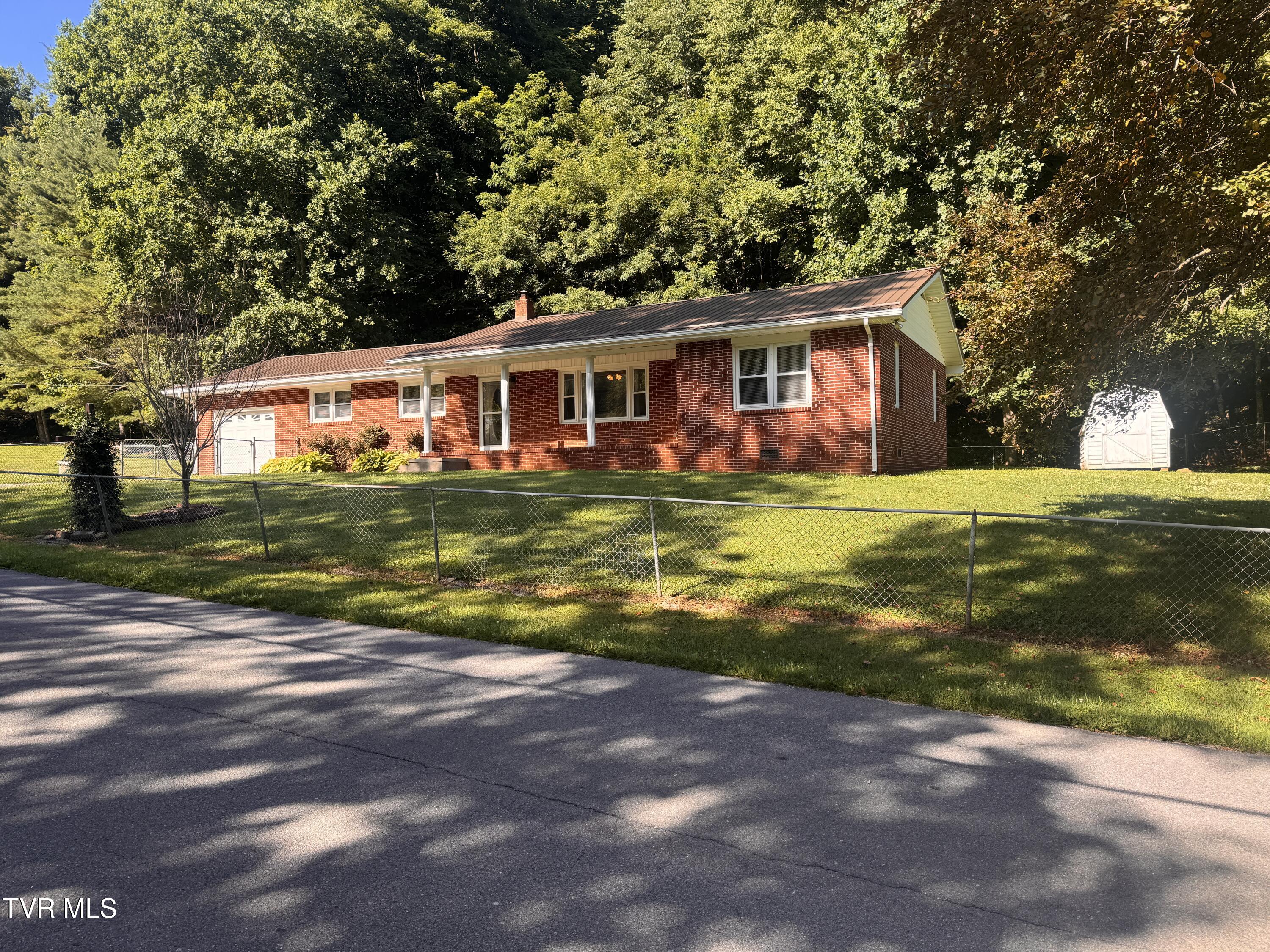 248 Burbank Road Roan Mountain, TN 37687 - Photo 2 of 65 IMG_6016