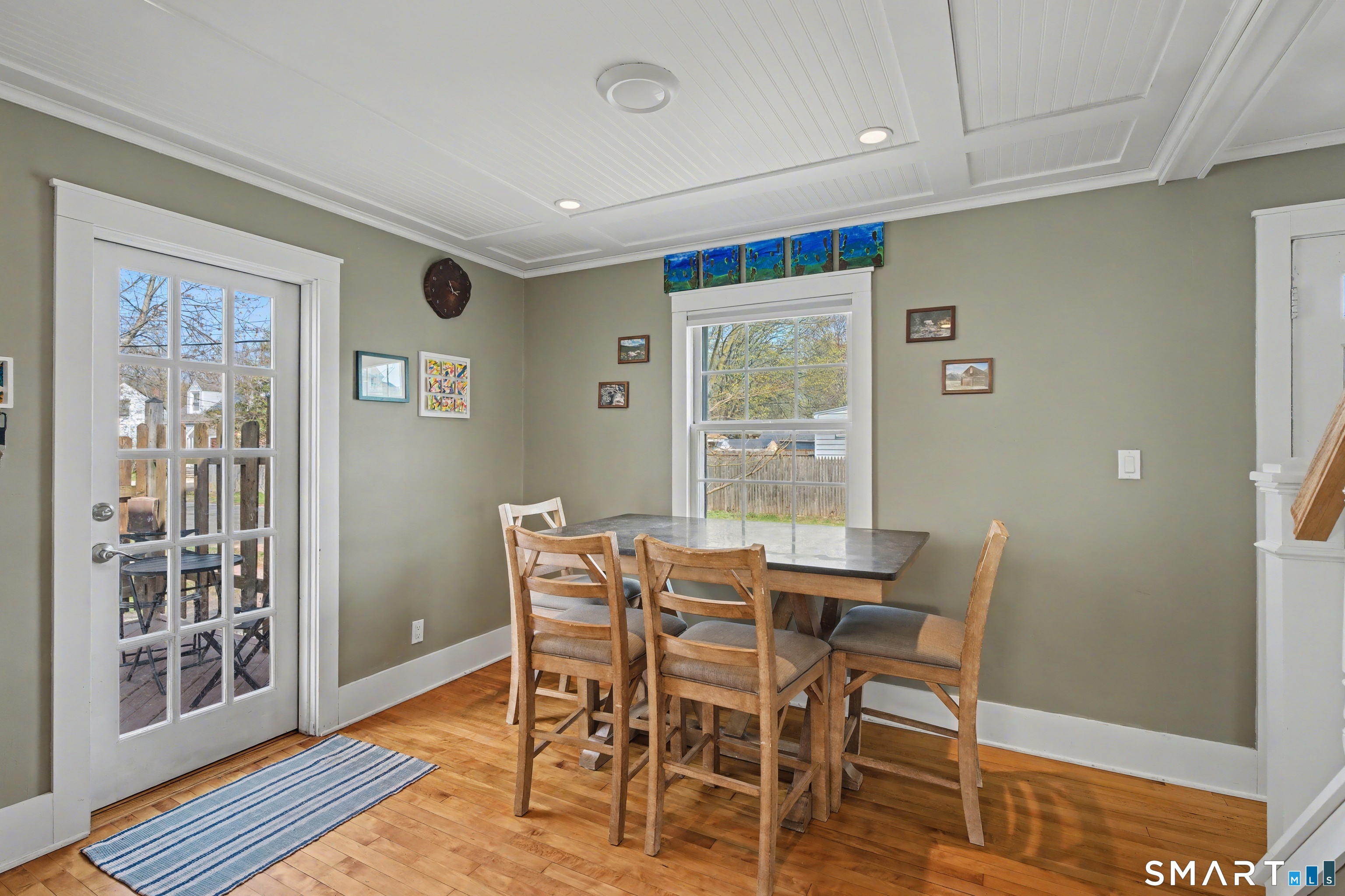 4 Dallas Street Hamden, CT 06514 - Photo 7 of 36 a view of a dining room with furniture and wooden floor