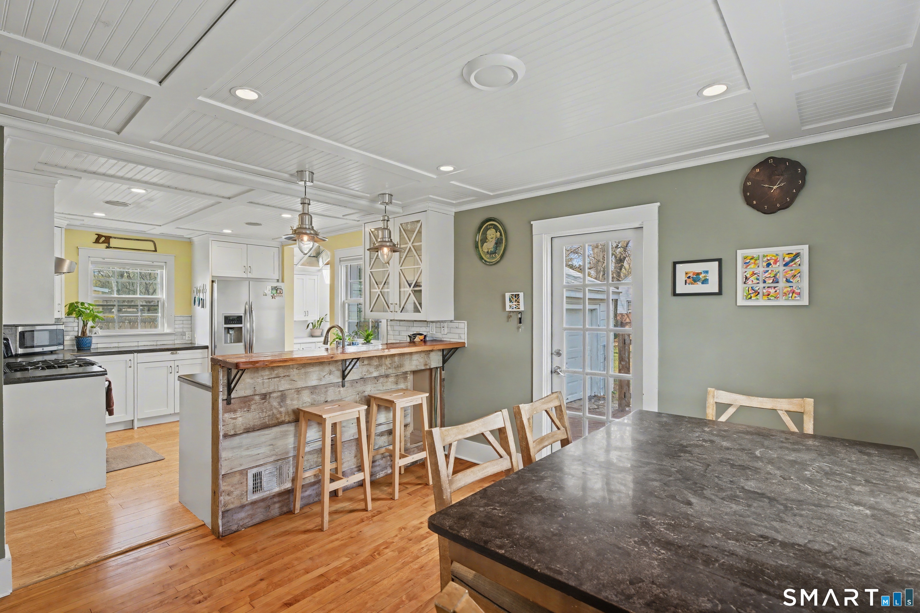 4 Dallas Street Hamden, CT 06514 - Photo 8 of 36 a view of a dining room with furniture and wooden floor