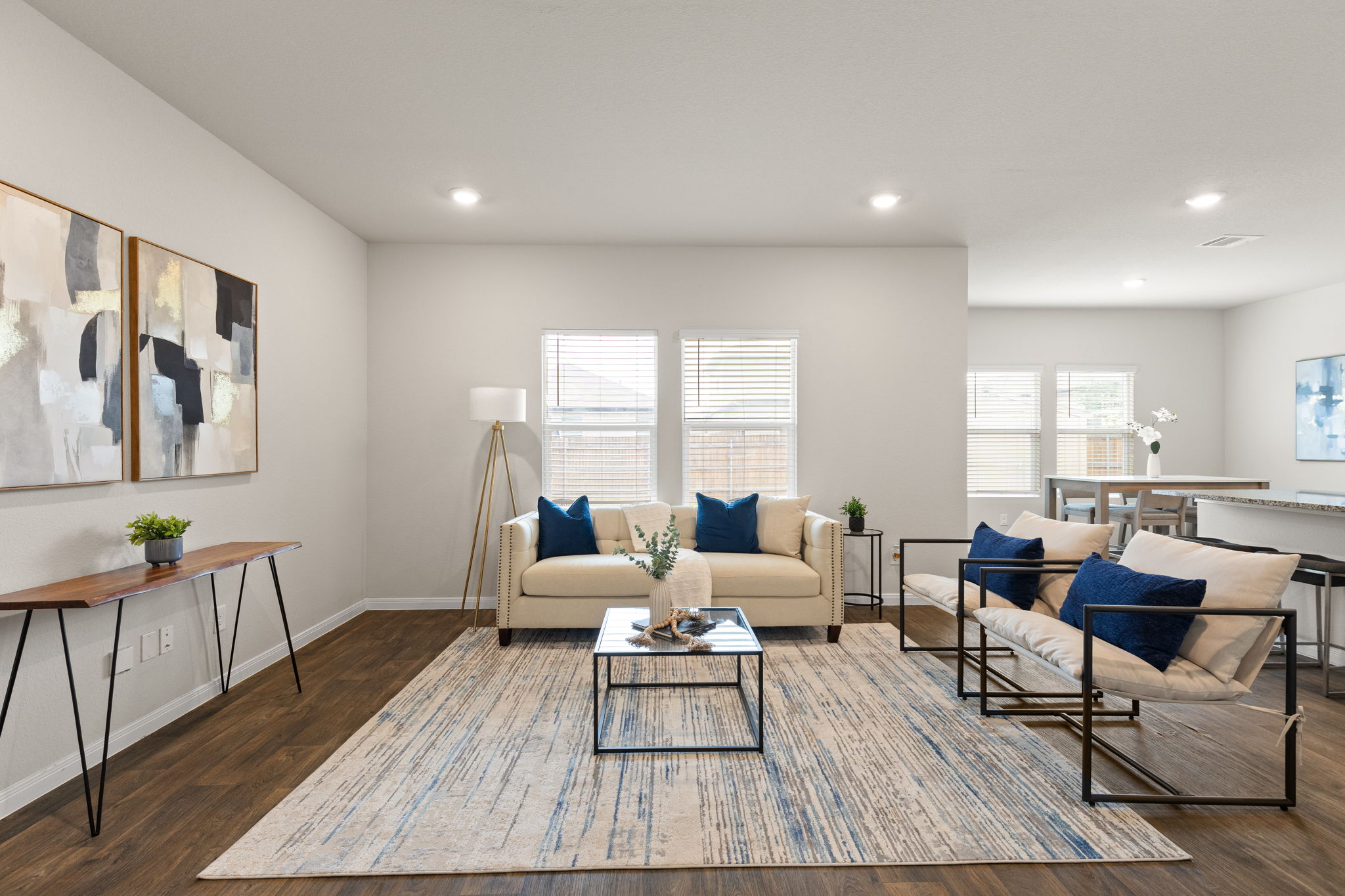 281 Jayden Drive Kyle, TX 78640 - Photo 2 of 36 Spacious living area featuring wood-finish flooring and recessed lighting
