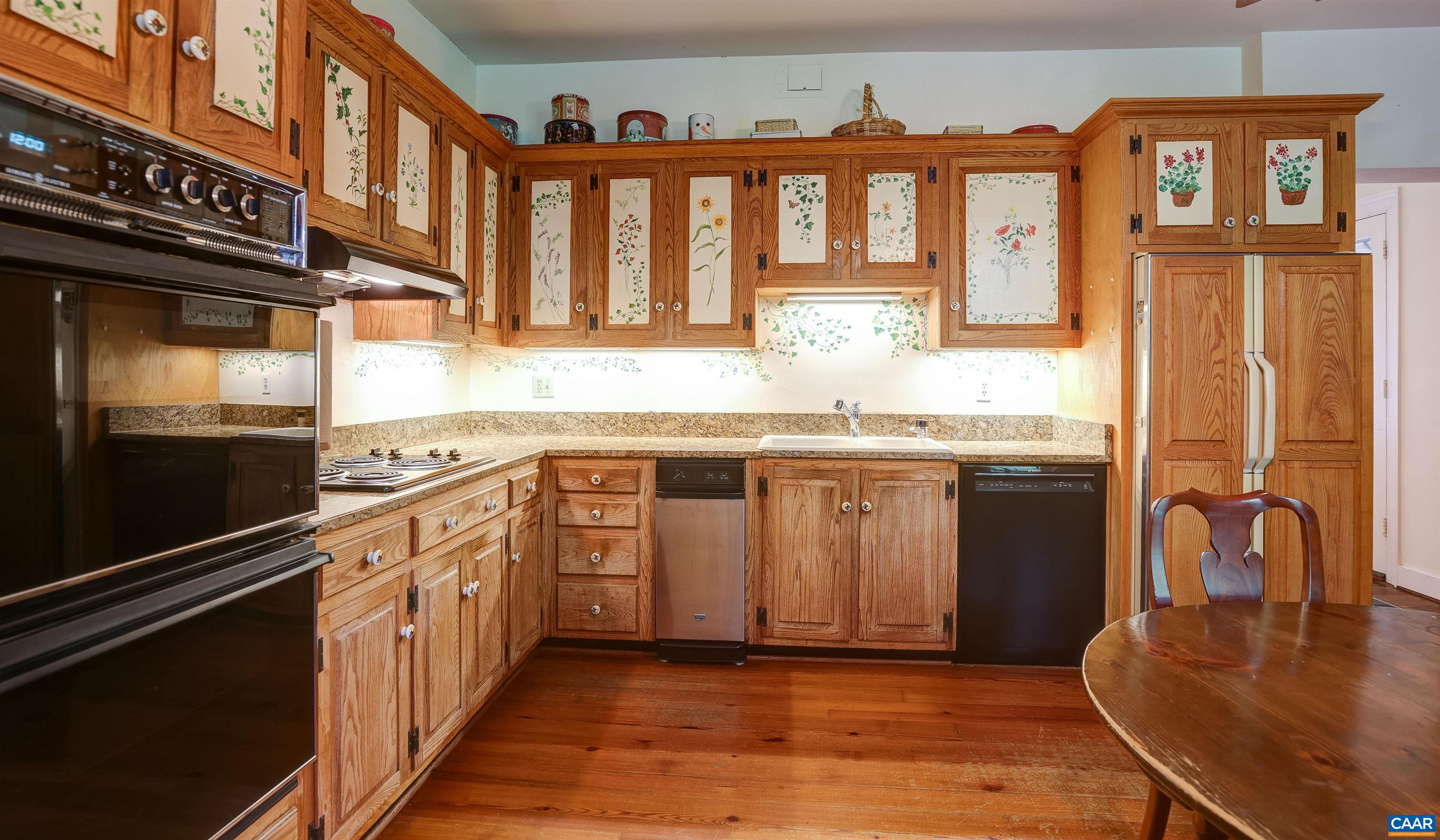 2051 Polo Grounds Road Charlottesville, VA 22911 - Photo 11 of 74 a kitchen with stainless steel appliances granite countertop a stove and a sink