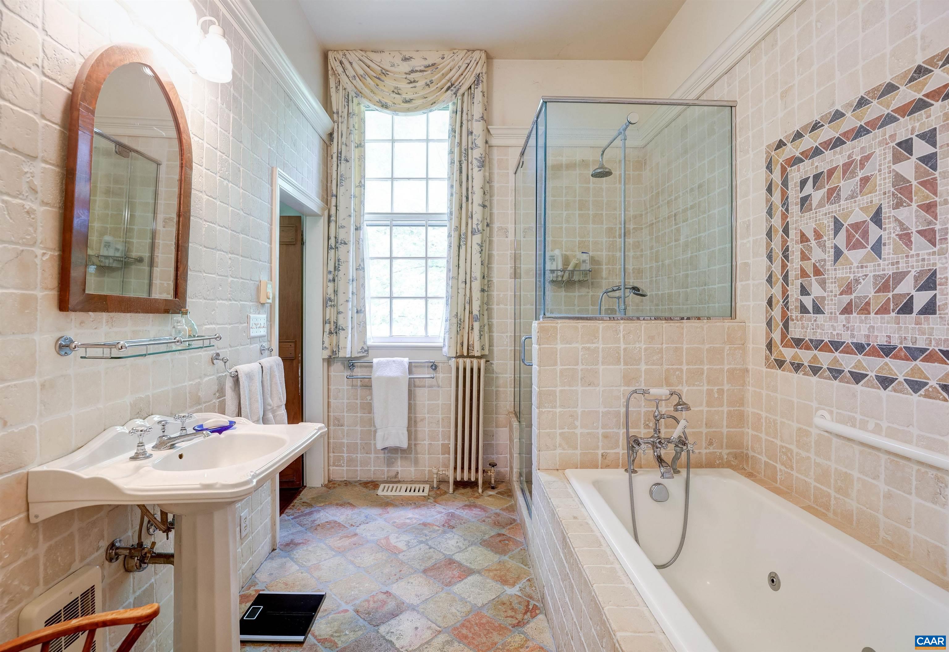 2051 Polo Grounds Road Charlottesville, VA 22911 - Photo 22 of 74 a bathroom with a sink and a bathtub